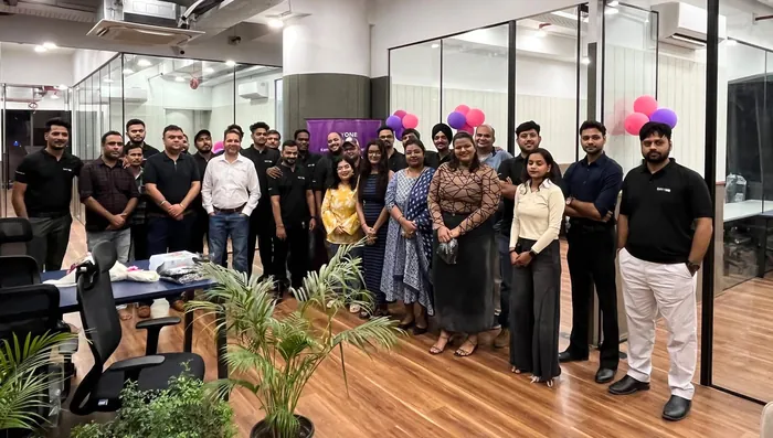 BayOne team celebrating the new office