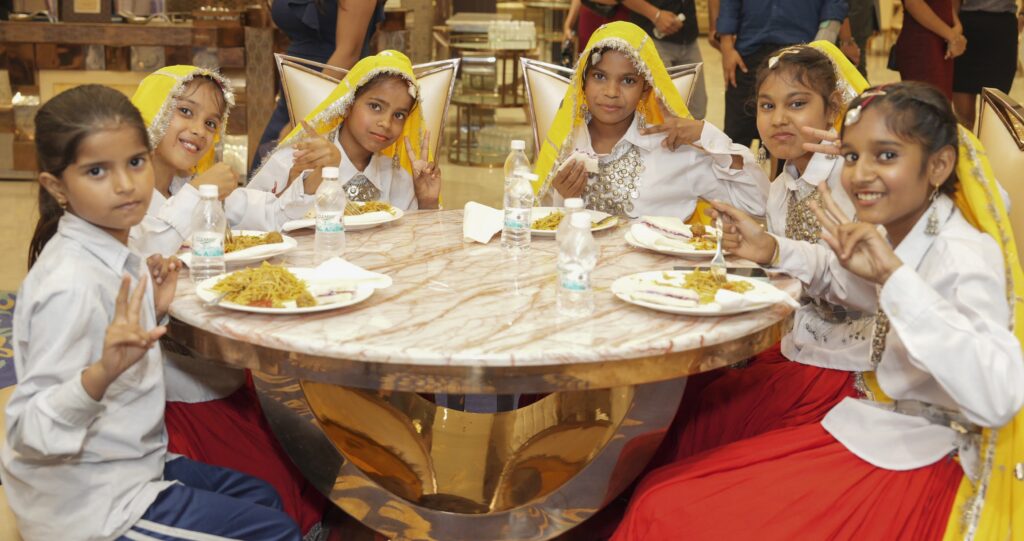 Children enjoying the delicious meal 